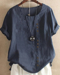 Elegant short-sleeve blouse featuring a stylish round neckline, perfect for casual and formal occasions. 3