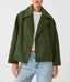 Military green cropped peacoat worn with jeans