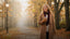 Woman in a camel wool coat on an autumn avenue