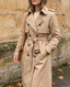 Woman in a beige belted trench coat, Lauren Boutique jackets and coats