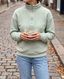 Woman in a textured knit quarter-zip pullover, Lauren Boutique sweaters
