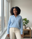 Woman wearing the Lauren Boutique polo sweater with classic collar