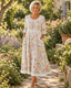 The Meadow Dress in the garden