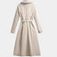 Cream belted midi trench coat shown from the front