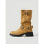 Camel biker boots worn with cuffed denim