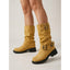 Camel boots shown against a plain background