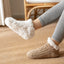 Women's Cable Knit Slipper Socks with Soft Lining and Non-Slip Sole in beige