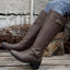 Dark brown riding boots shown from the side