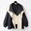 Women's color block hooded trench coat in black with cream collar