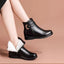 Black ankle boots shown from the side