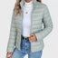 Detail of the quilted channels on the sage green puffer jacket
