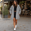 Puffer jacket styled with jeans and trainers