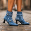 Women's double buckle pointed toe heeled boots in denim