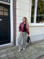 Bomber jacket styled with printed trousers