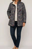 Women's quilted puffer jacket in gray wildflower print