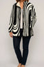 Women's quilted puffer jacket in black geometric print