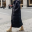 Navy black maxi puffer coat shown full length