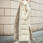 Detail of the quilted channels on the maxi puffer coat