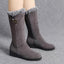 Grey fur cuff boots shown from the side