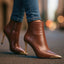 Mocha brown stiletto ankle boots styled with denim