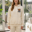 Women's Highland Cow Print Hoodie with Brushed Lining and Front Pocket in white