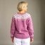 Back view of the dusty pink Icelandic knit cardigan