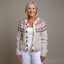 Women's Icelandic fair isle knit cardigan in grey with rose floral yoke, front view