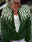 Close-up of the white snowflake yoke on the forest green cardigan