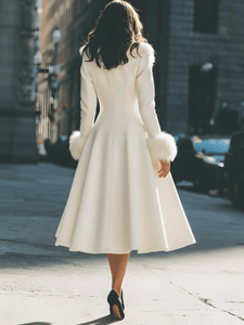 Back view of the ivory A-line flared winter coat
