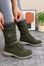 Green knee high winter boots with knit cuff