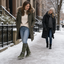 Knee high winter boots worn in the snow