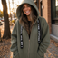 Hooded coat worn with the hood up