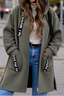 Longline hooded coat shown from the front