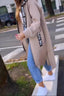 Sweatshirt coat styled with a tote bag