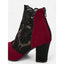 Wine ankle boots seen from the side