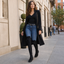 Black over the knee boots worn on the street