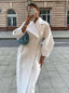 White duster coat shown from the front