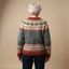 Back view of the grey and rust Nordic knit cardigan