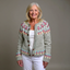 Women's Norwegian fair isle knit cardigan in grey with floral yoke, front view