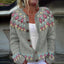 Close-up of the pink and mint floral yoke on the grey cardigan