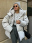 Women's oversized hooded puffer coat in beige