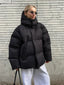 Women's oversized hooded puffer coat in black