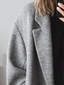 Grey oversized open front coat shown from the side