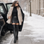 Over the knee snow boots worn in the snow