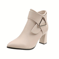 Women's pointed toe ankle boots with metal trim in beige