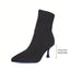Black pointed sock boot shown against a plain background