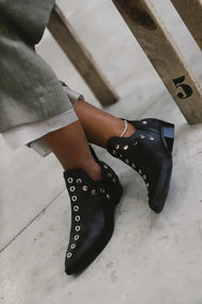 Women's pointed toe studded ankle boots in black