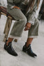 Stud detail along the seams of the boot