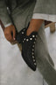 Close up of the studded topline and pointed toe