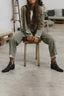 Studded ankle boots styled with a relaxed outfit